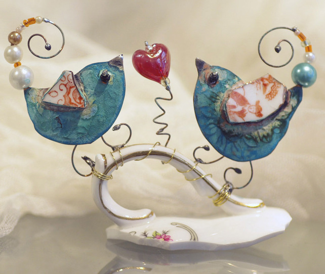 birds on cup handle